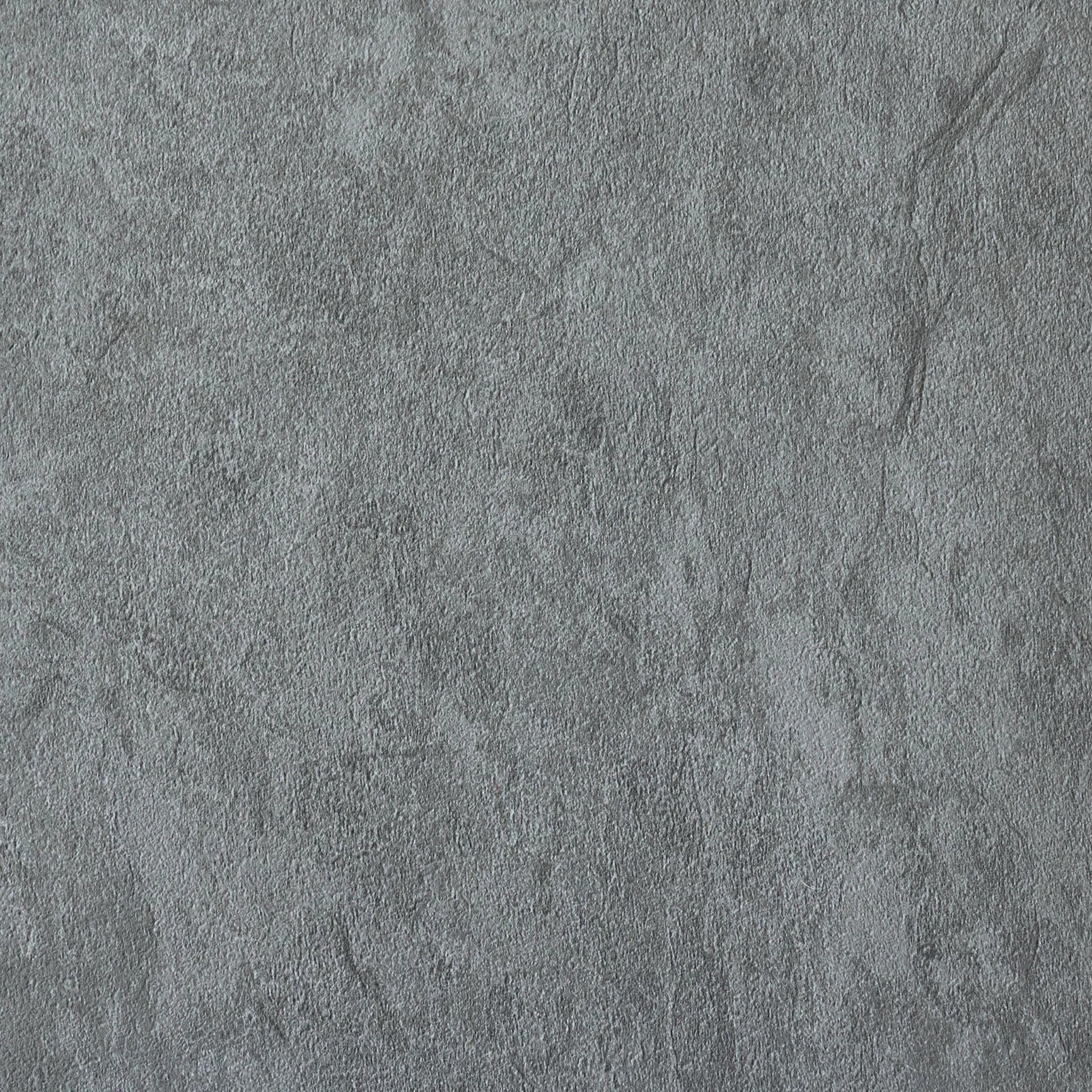 close-up of a concrete-effect vinyl plank in grey