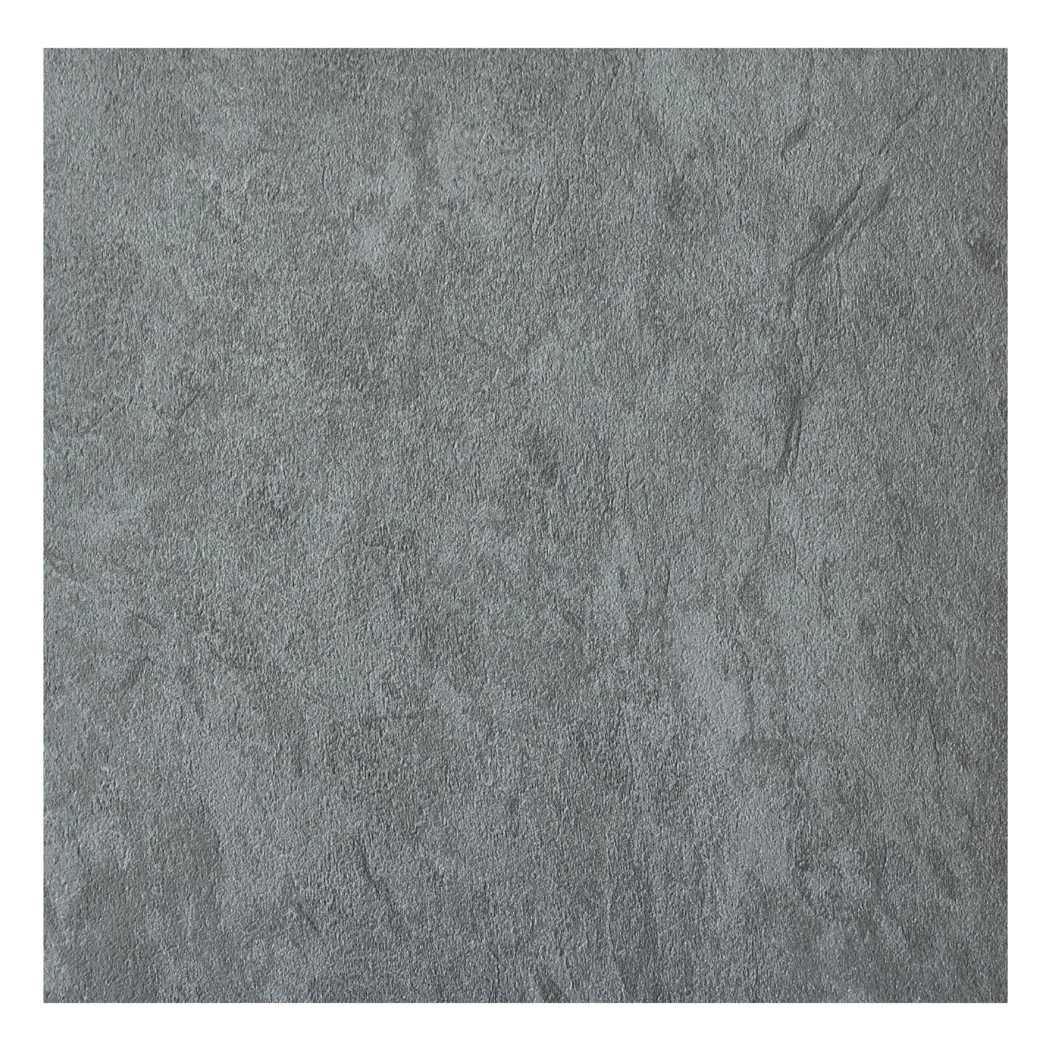 detailed view of grey tile-effect concrete flooring with subtle grain patterns