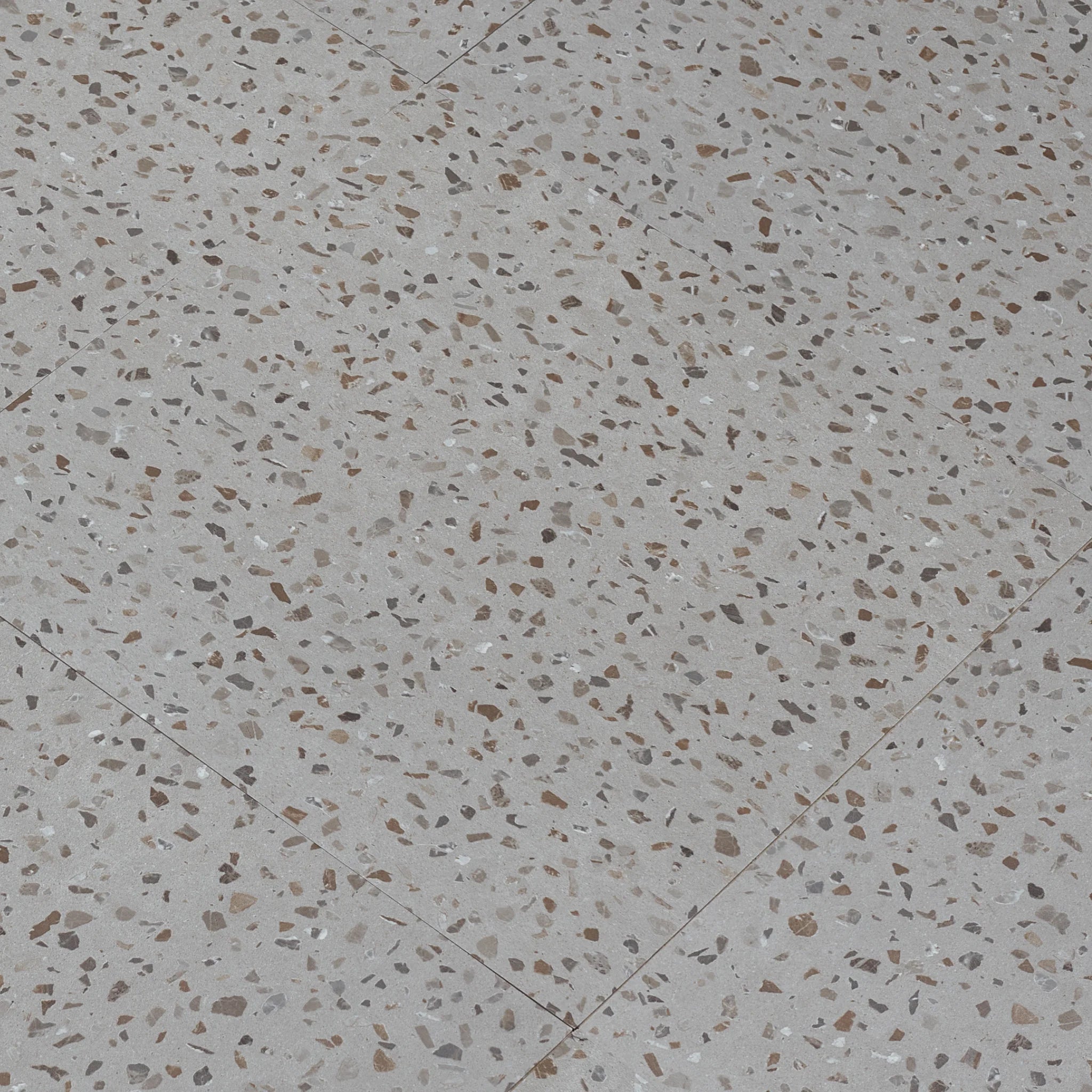 Self-adhesive terrazzo floor tiles with speckled stone chips