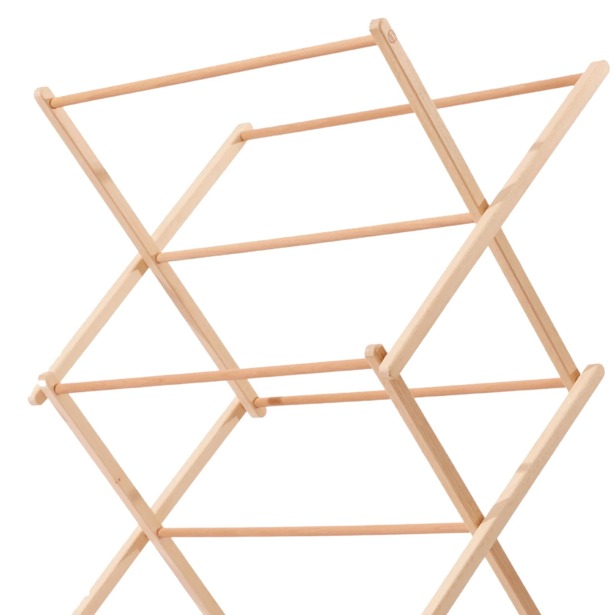 Close-up of a foldable wooden clothes drying rack