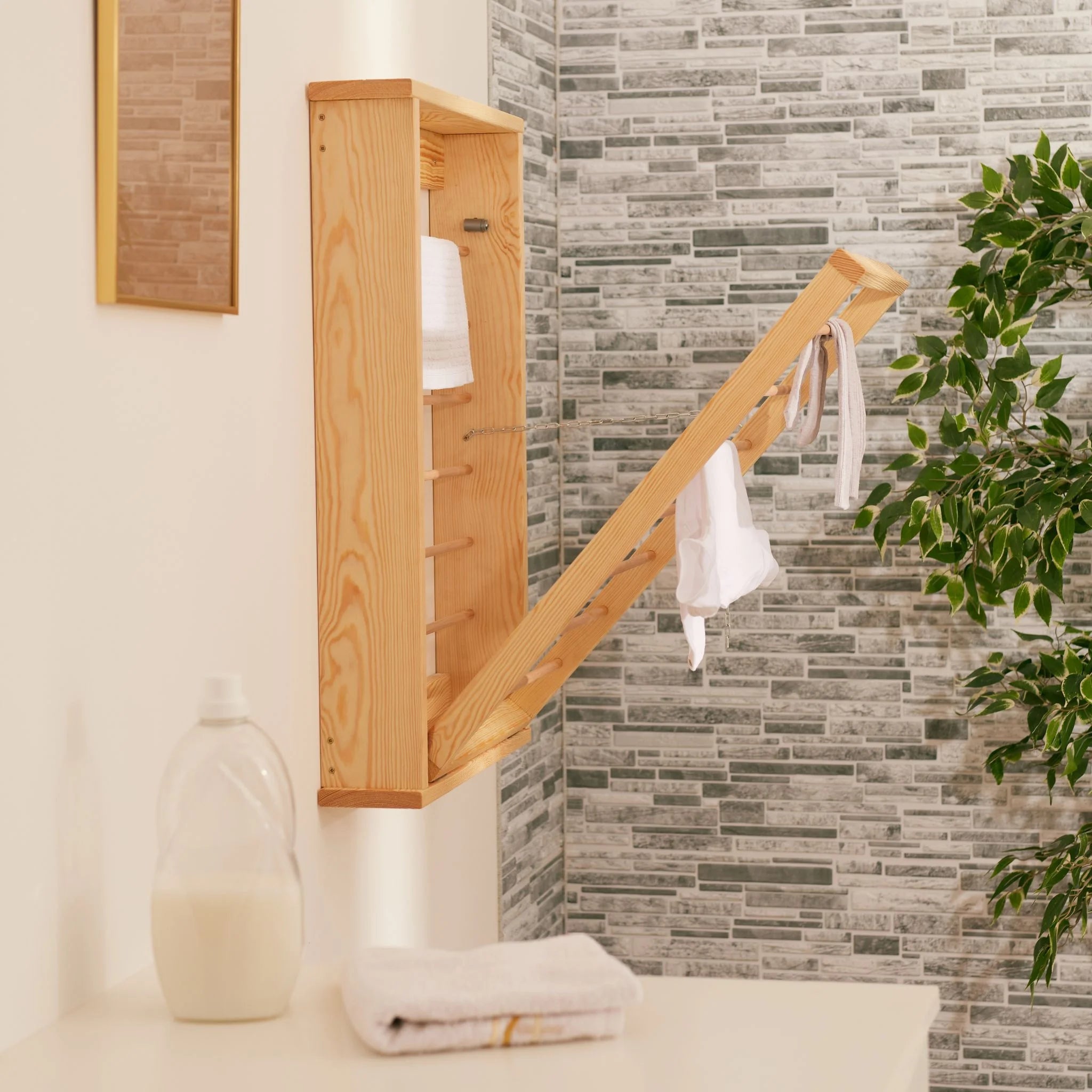 Wood wall clothes dryer extended with clothes