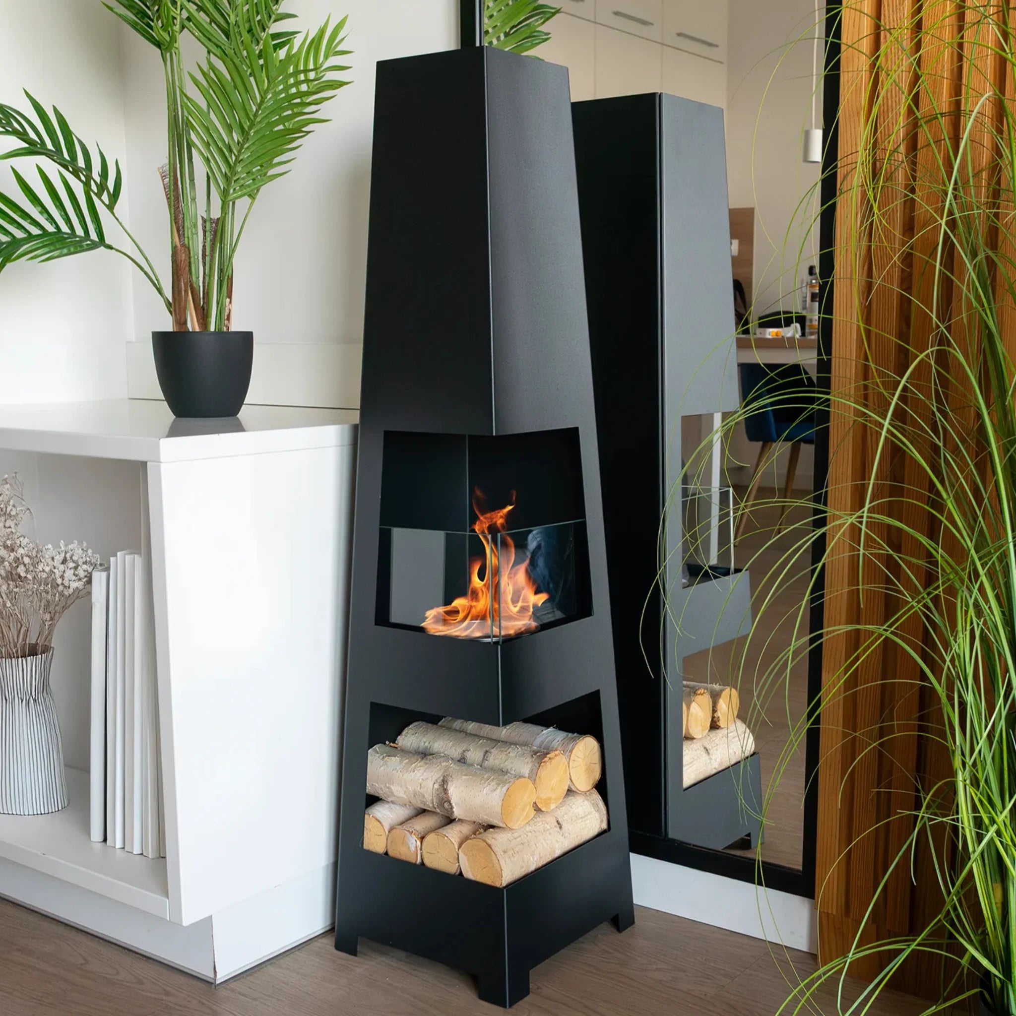 decorative black patio heater on terrace featuring real flame