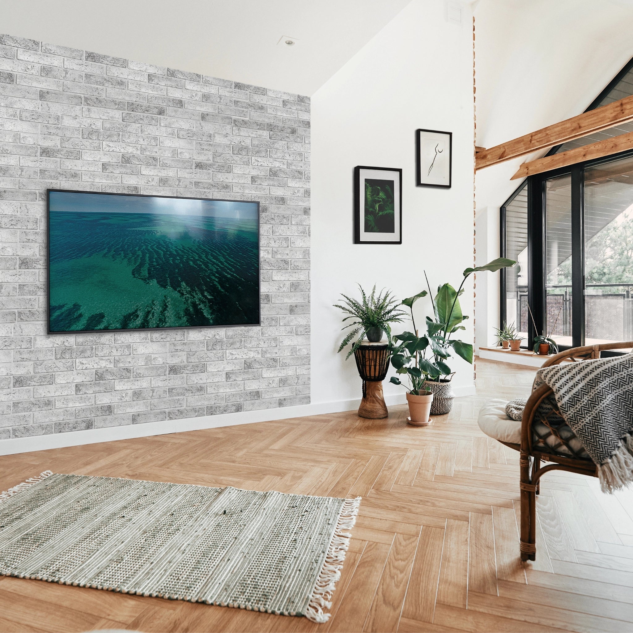 Modern living room with grey wall panel featuring geometric patterns