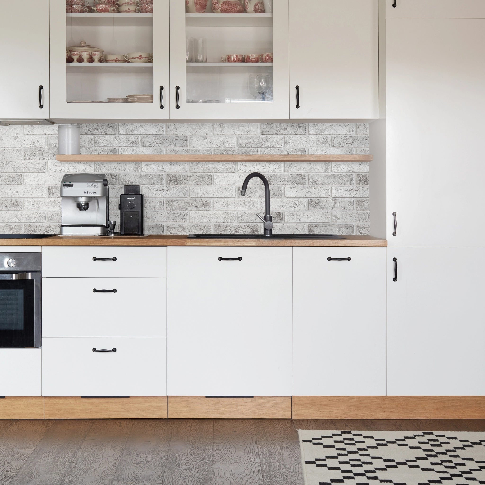 Kitchen with grey geometric-patterned wall panels and modern decor