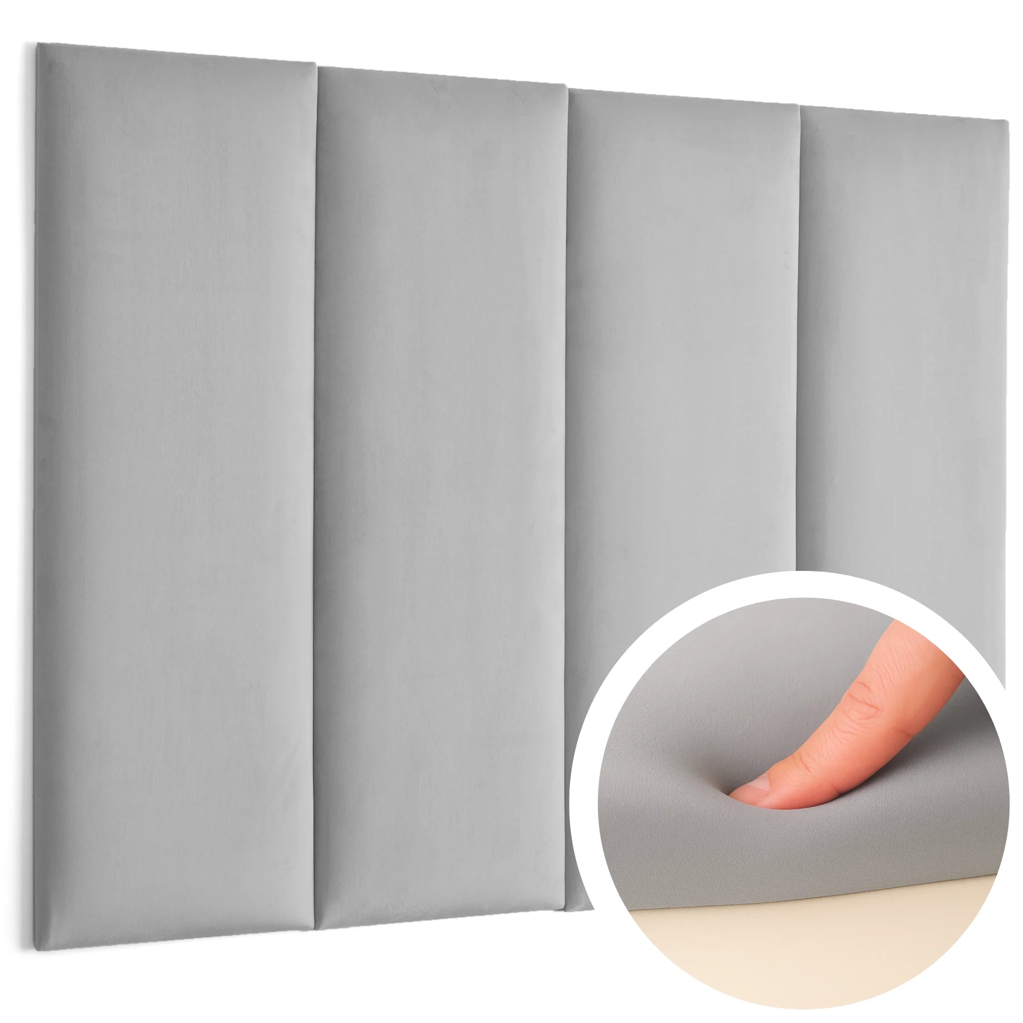 A person's finger pressing on soft padded wall panels