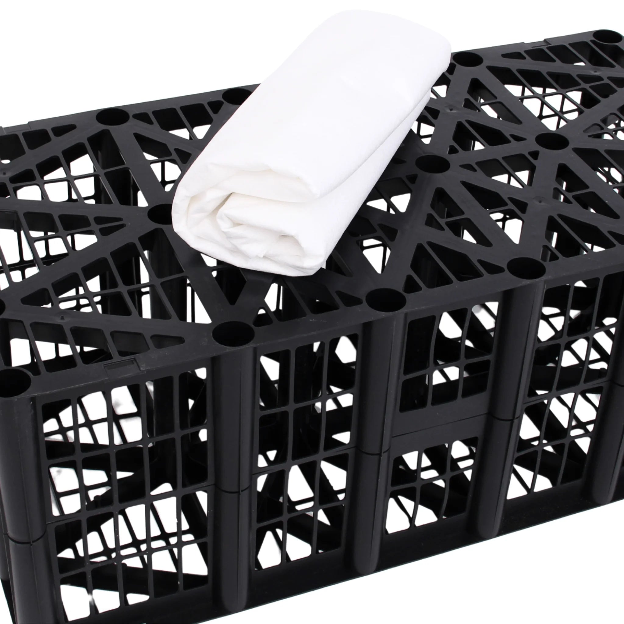 Close-up of a high-load plastic soakaway crate and nonwoven geotextile fabric
