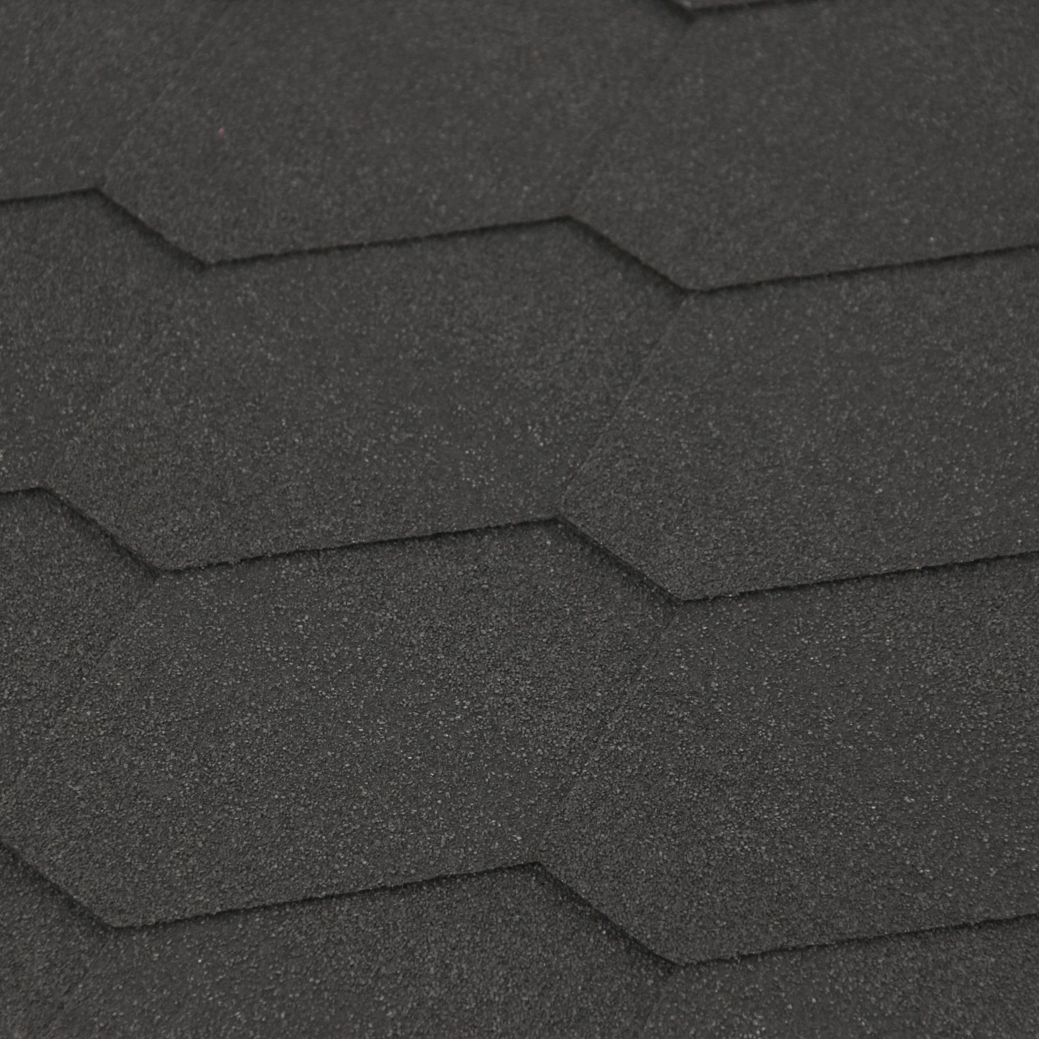 close-up of graphite hexagonal roofing shingles