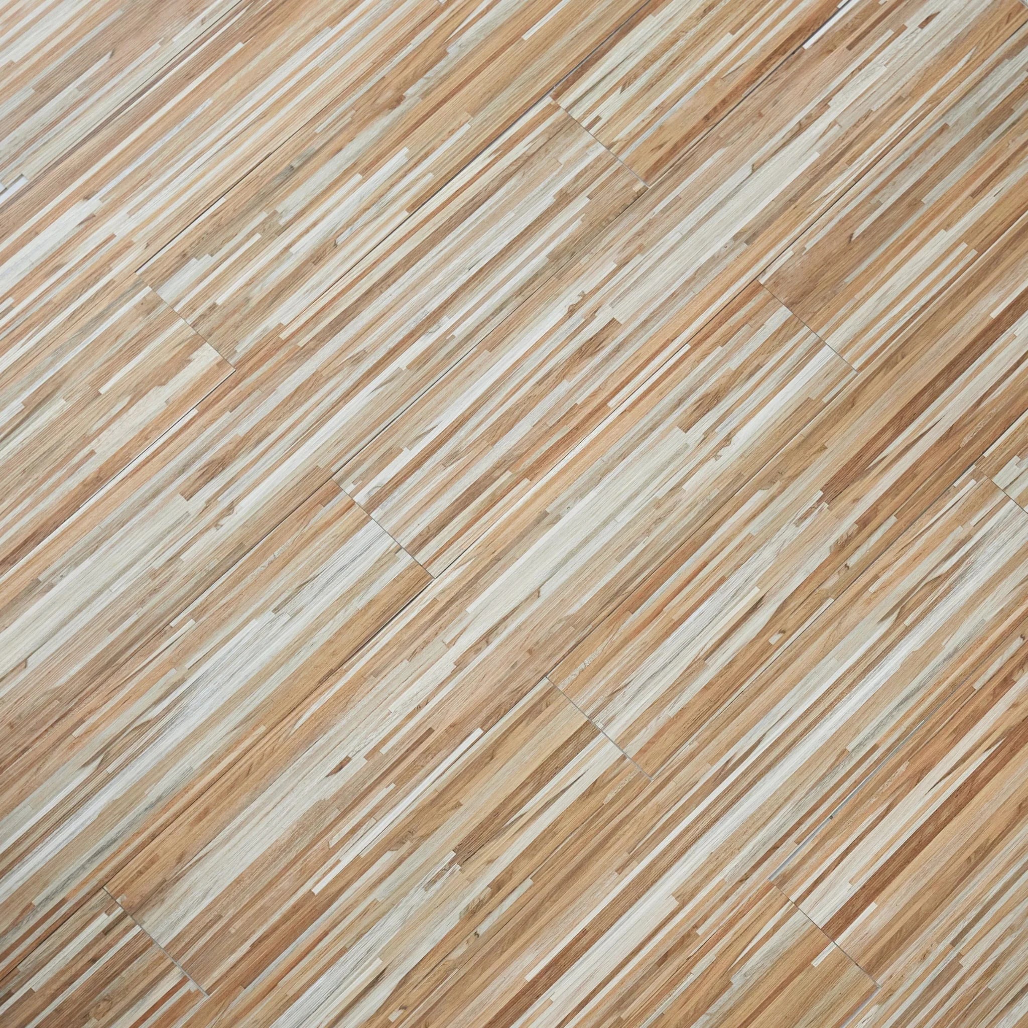 close-up of a wood-effect vinyl plank in stripped light and dark beige