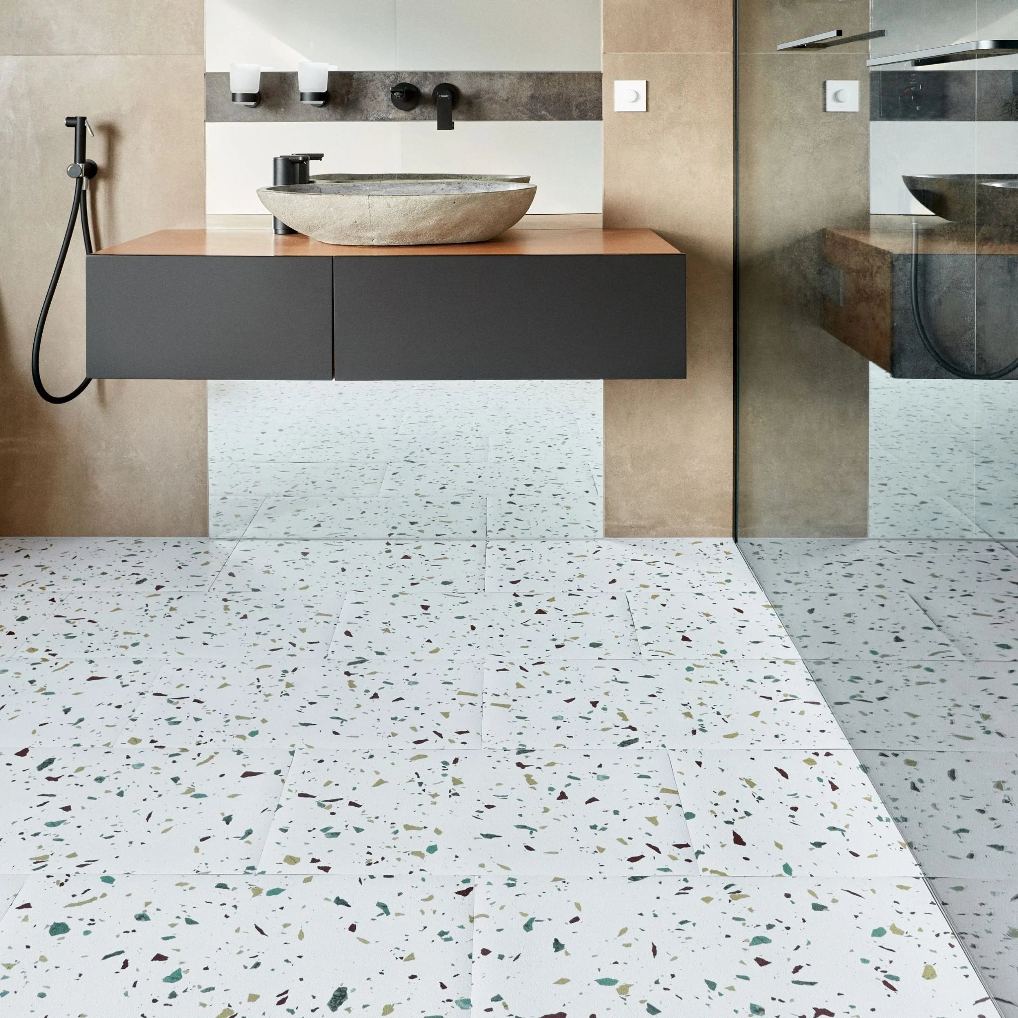 modern bathroom with large rectangular terrazzo tile flooring