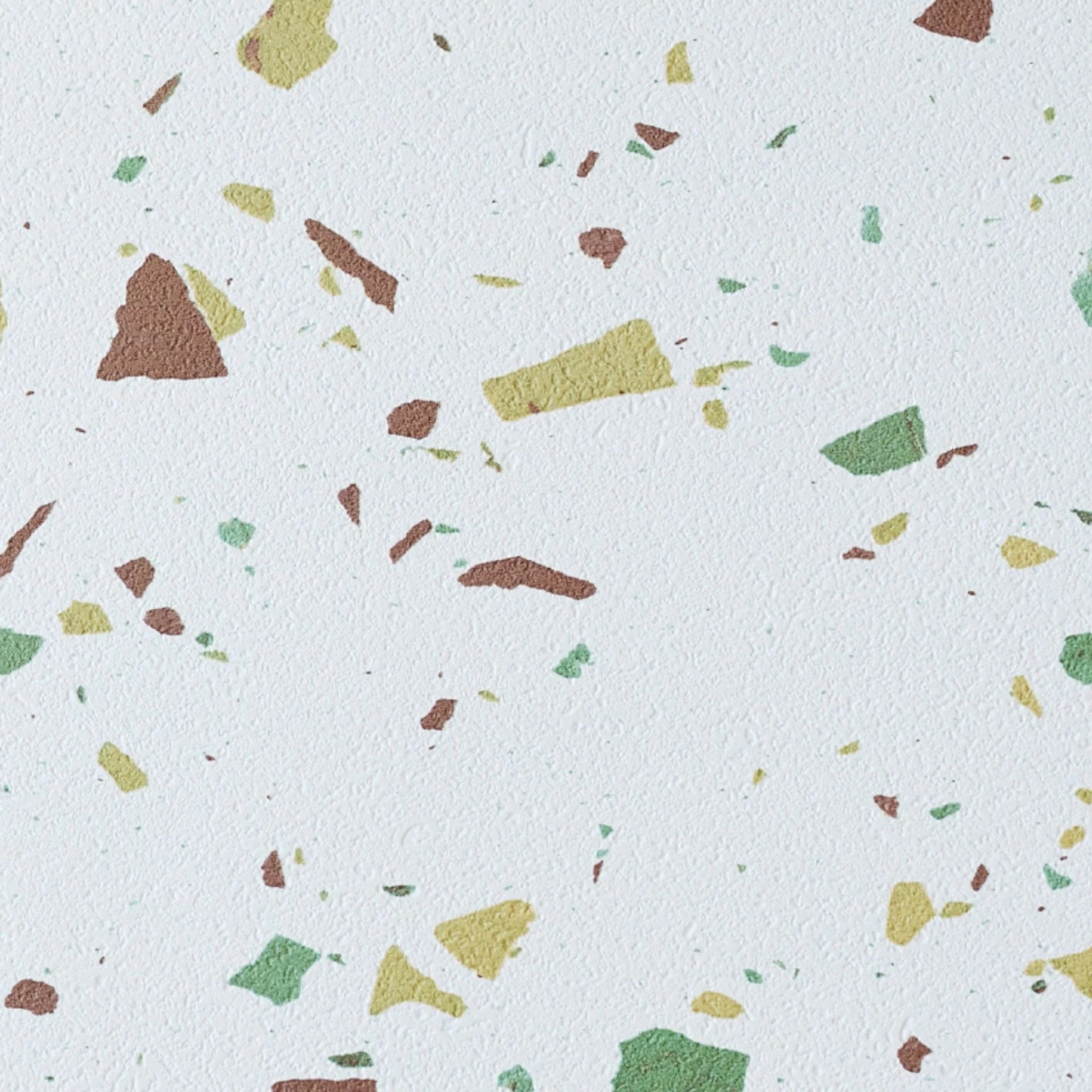 large rectangular terrazzo tile close-up with green and brown specks