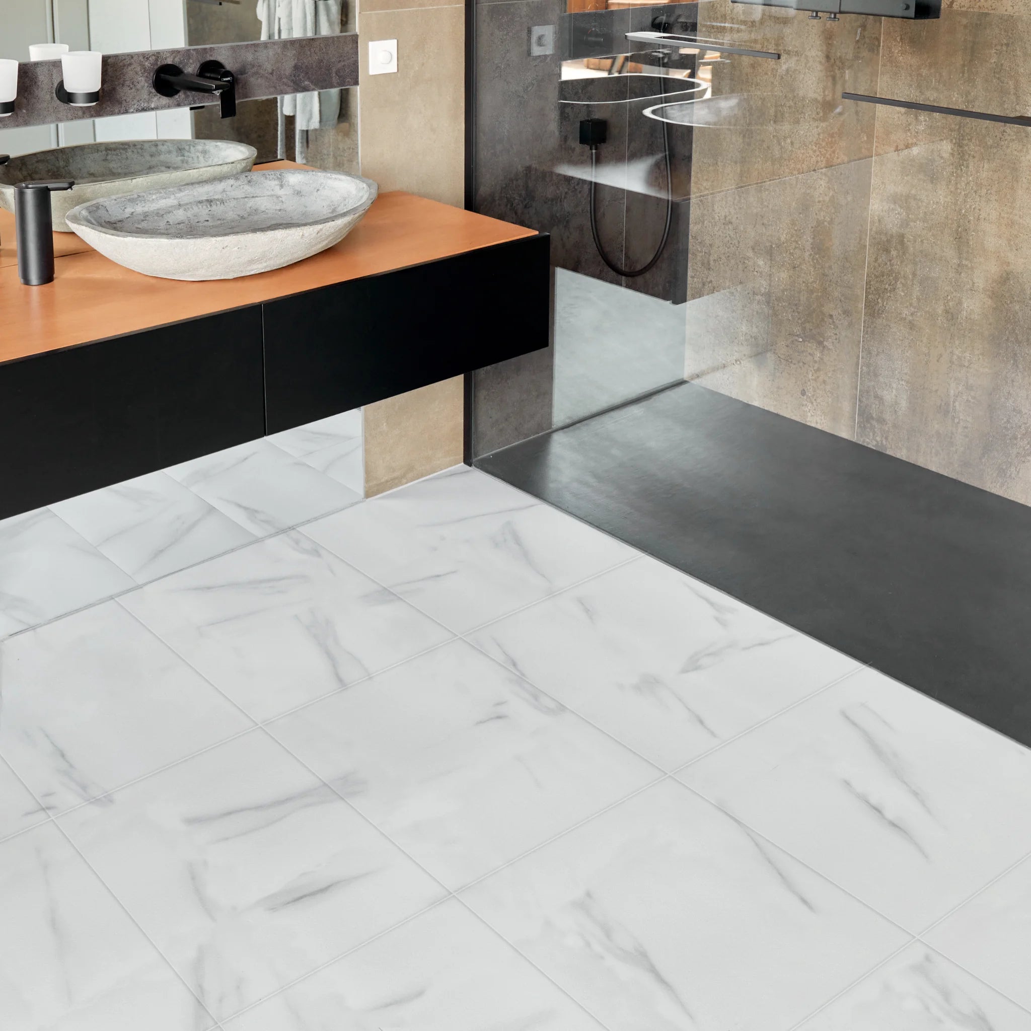 cozy bathroom with large square white marble tile flooring