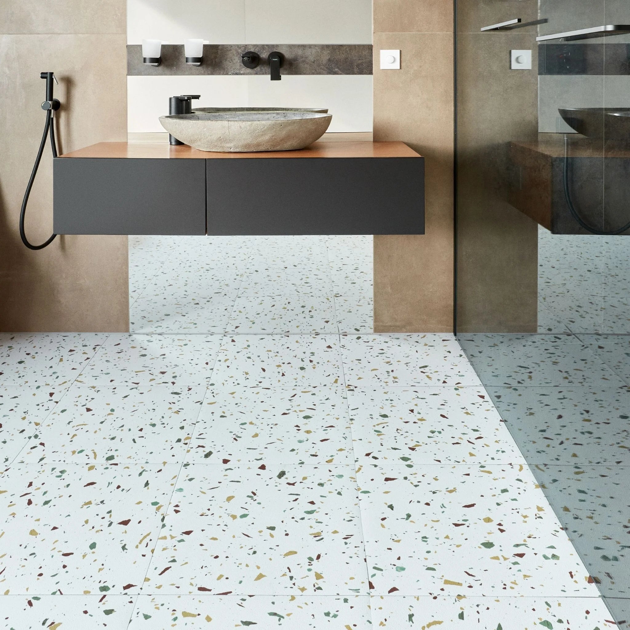 modern bathroom with large square terrazzo tile flooring