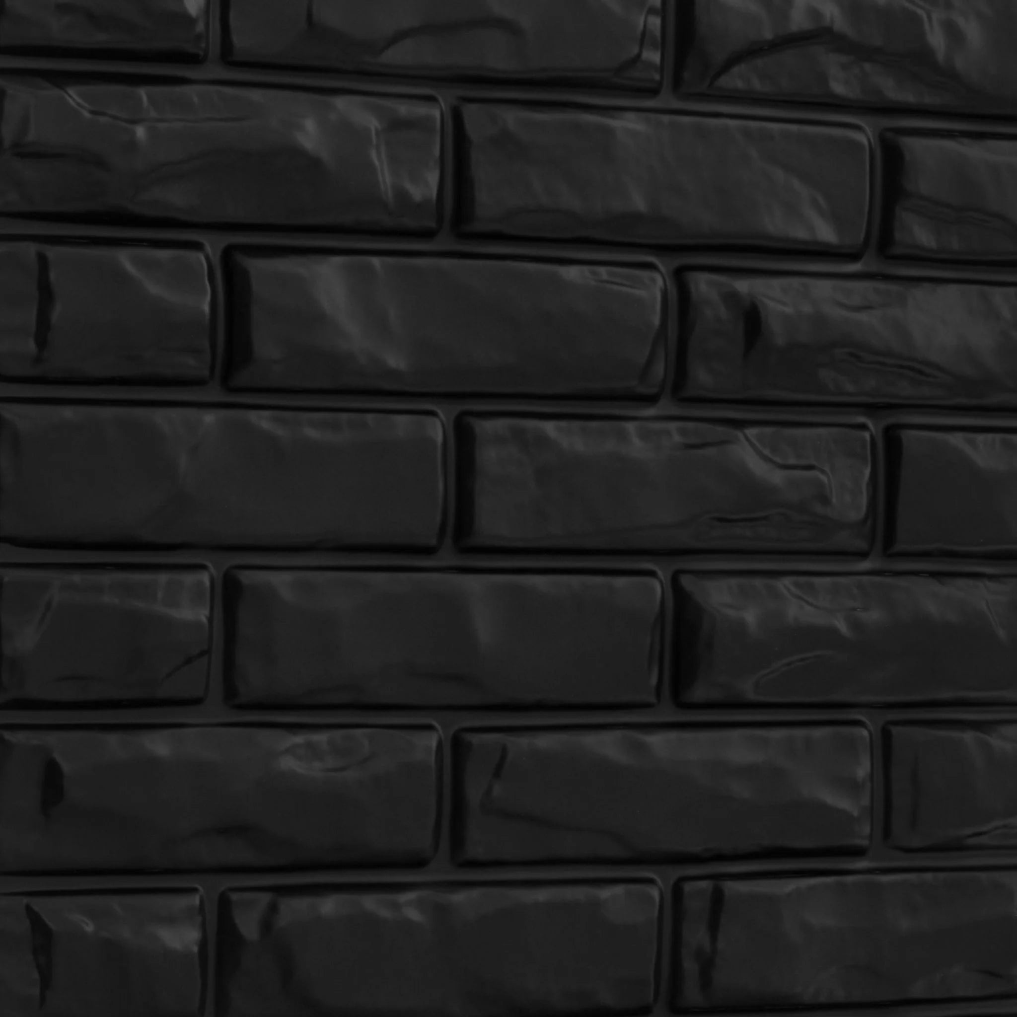 Close-up of black PVC wall panel with brick designs