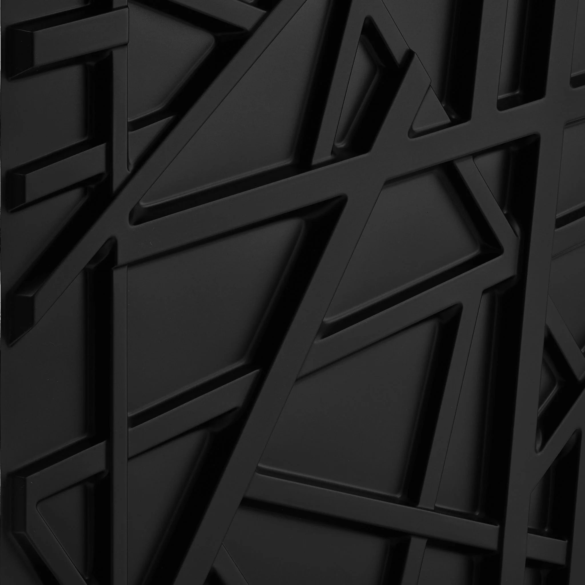 Close-up of black PVC wall panel with crisscross pattern