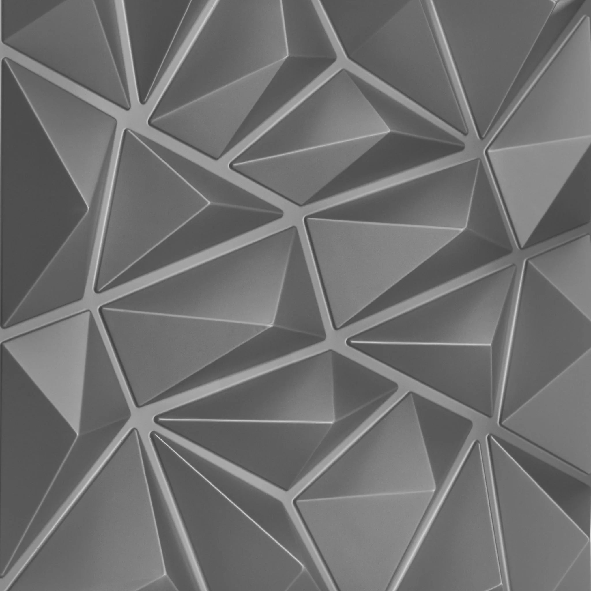 Close-up of silver PVC wall panel with geometric designs