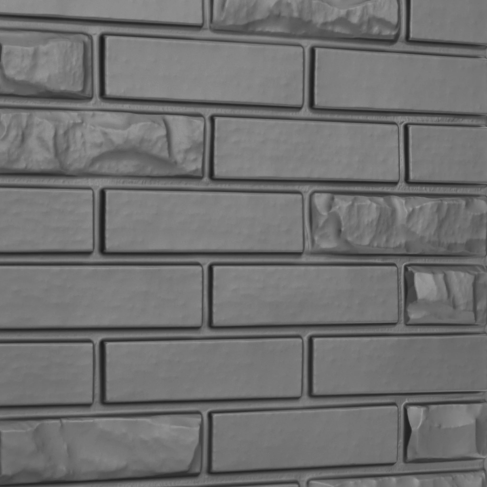 Close-up of silver PVC wall panel with brick designs