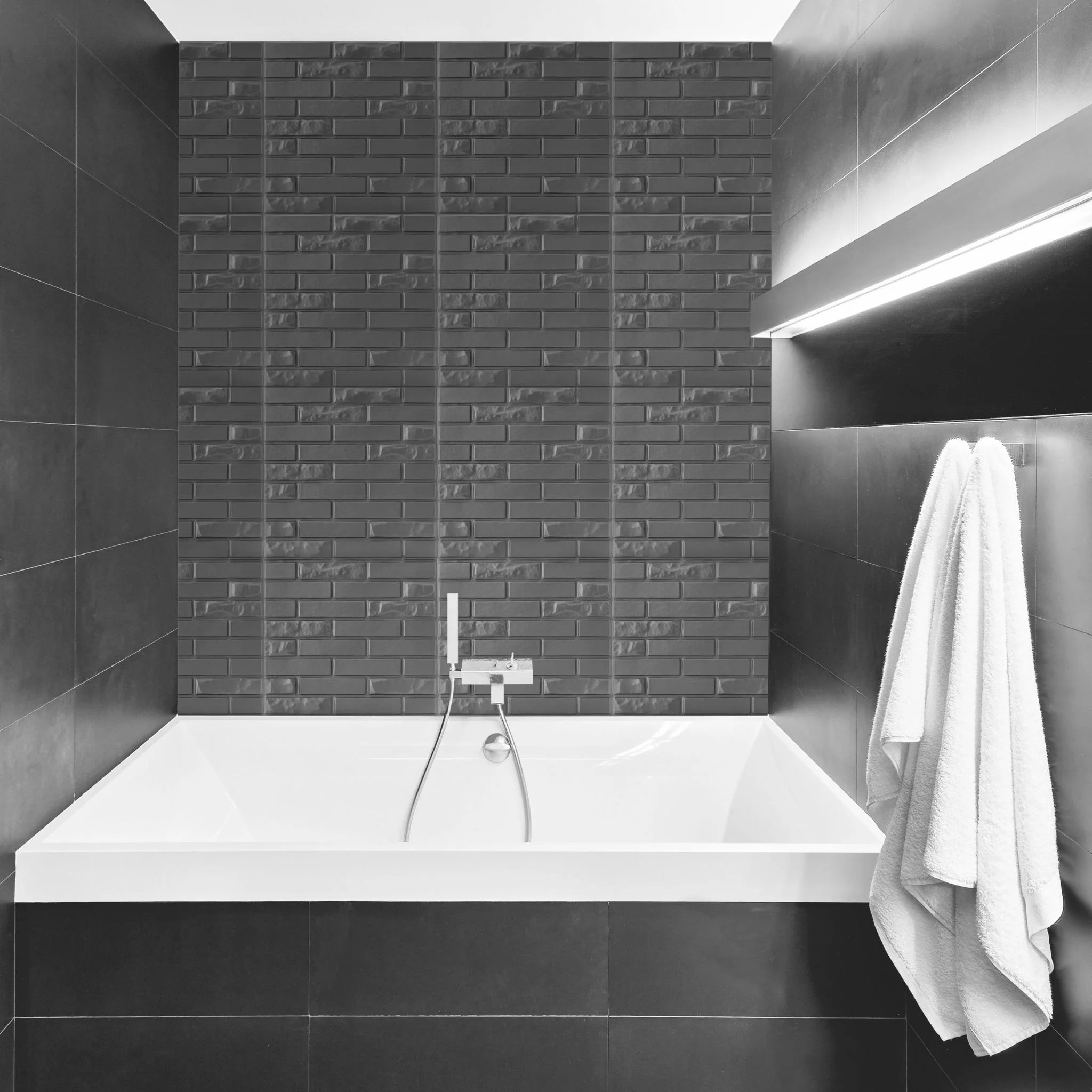 Bathroom with silver brick-patterned PVC wall panels and modern furniture