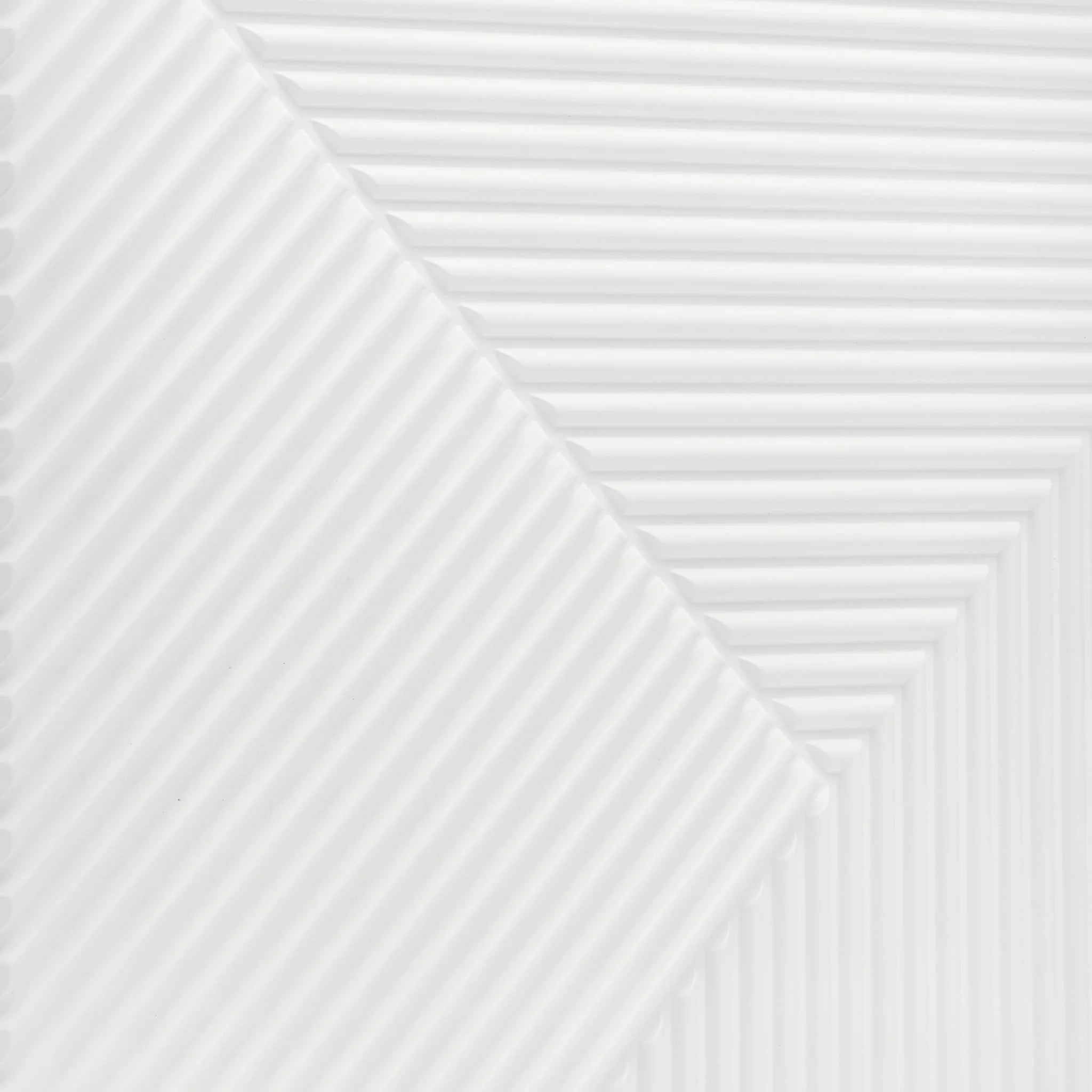 Close-up of white PVC wall panel with geometric design