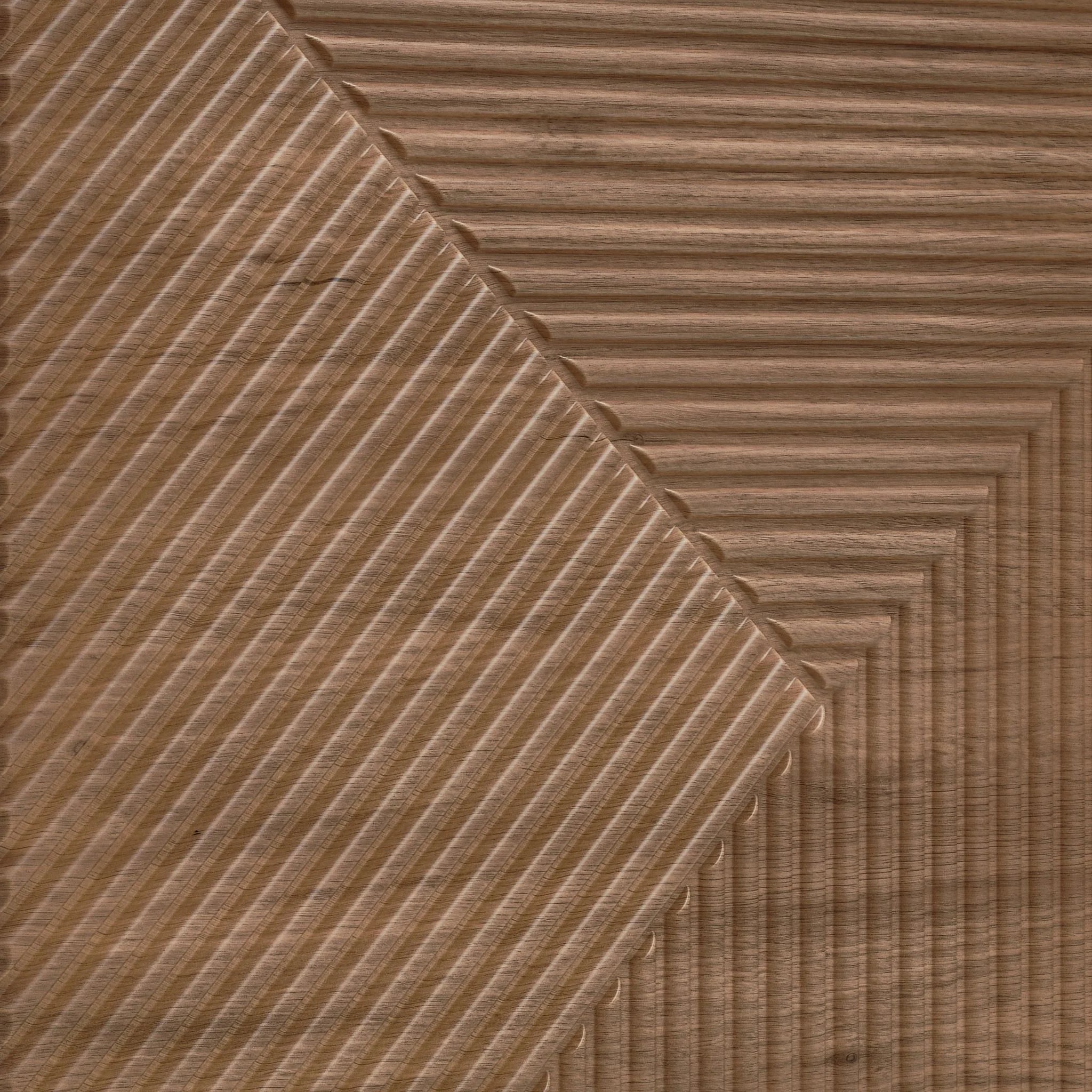 Close-up of wooden PVC wall panel with geometric design