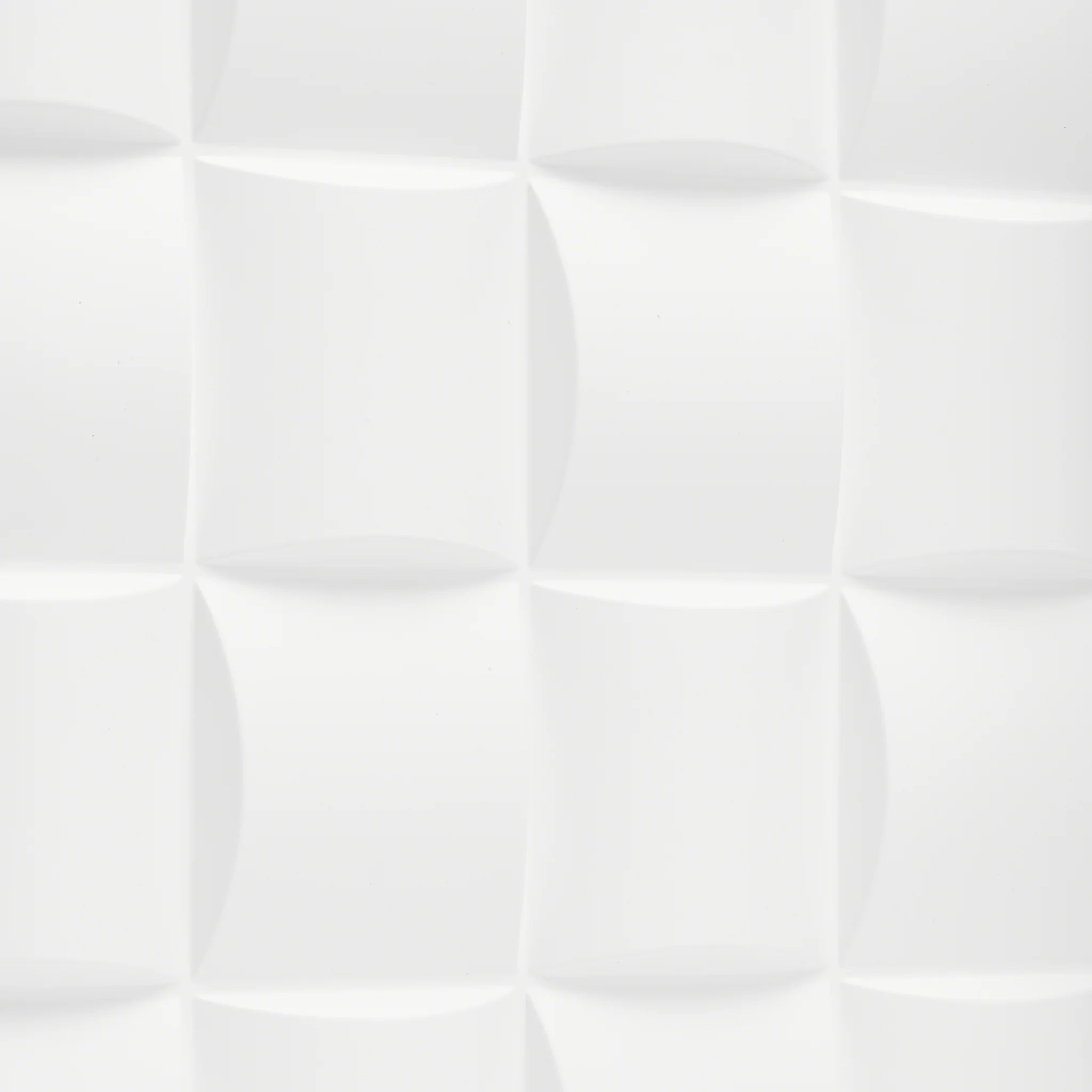 Close-up of white PVC wall panel with curved square design