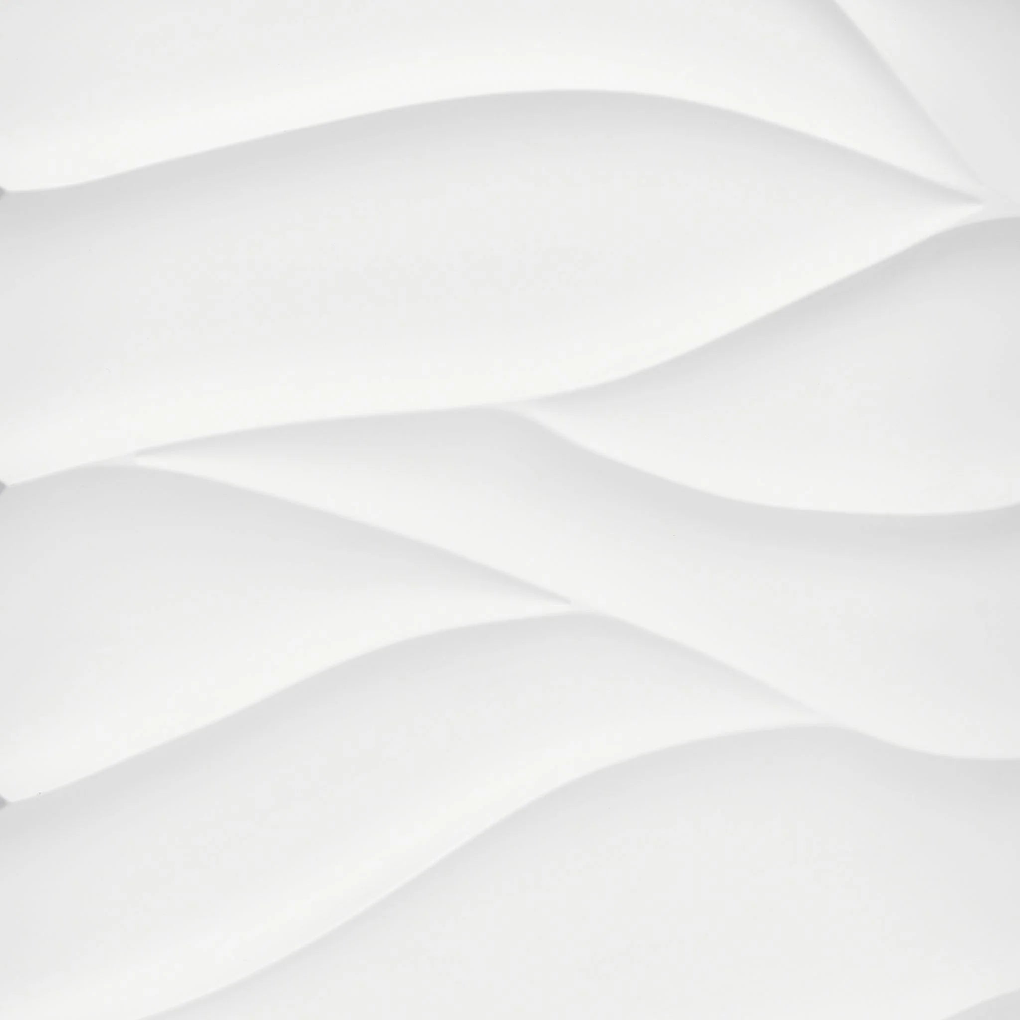 Close-up of white PVC wall panel with wavy designs