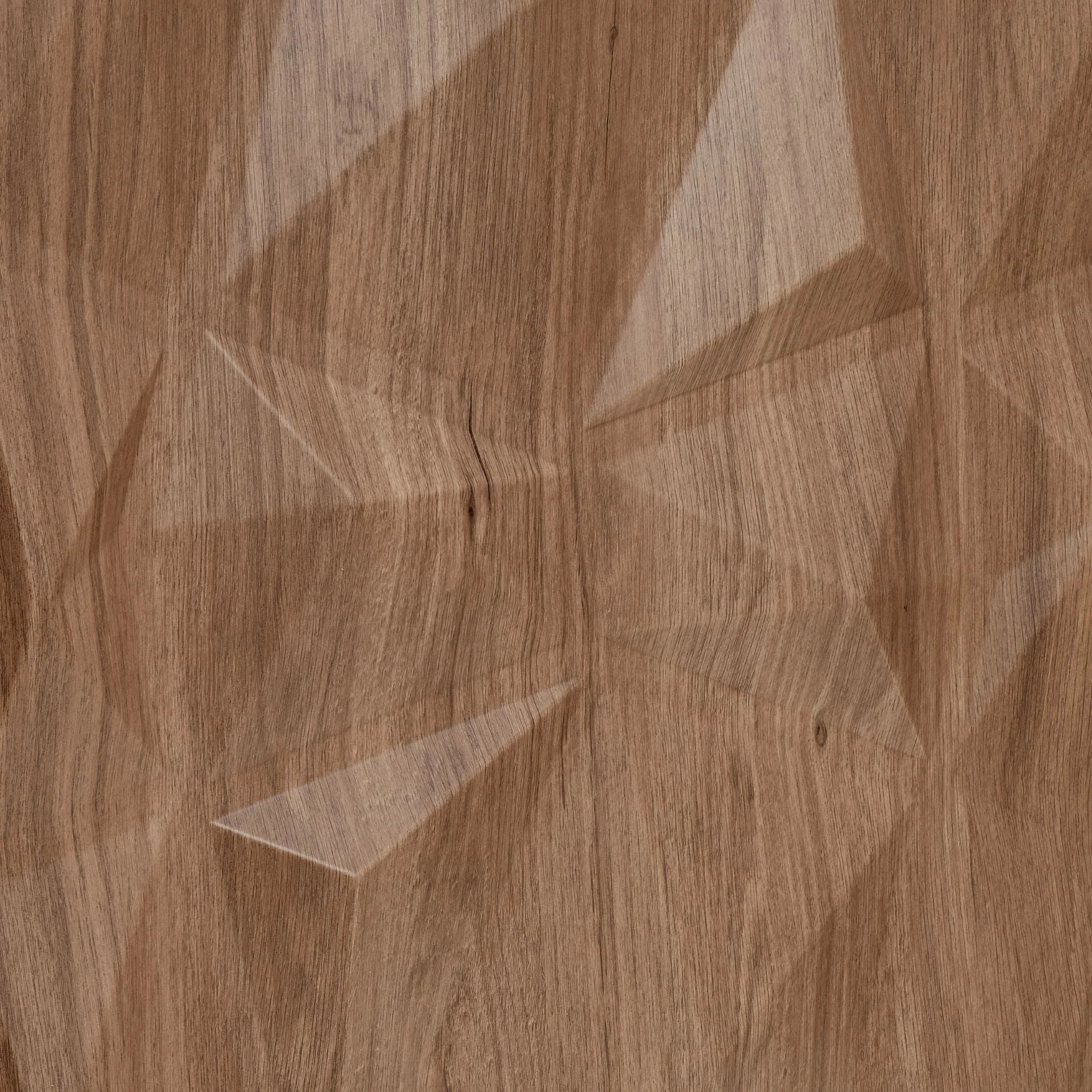 "Close-up of wooden PVC wall panel with geometric design "