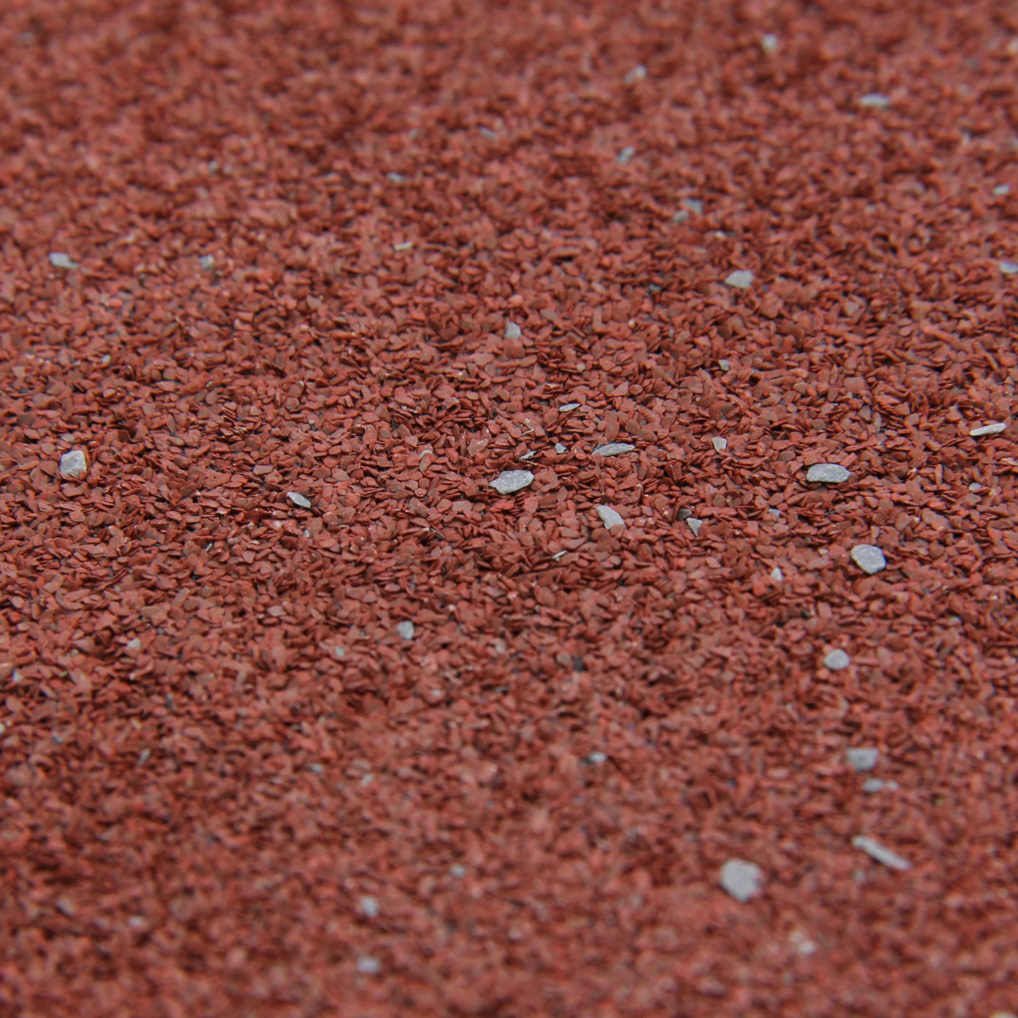 close-up of red roofing felt texture