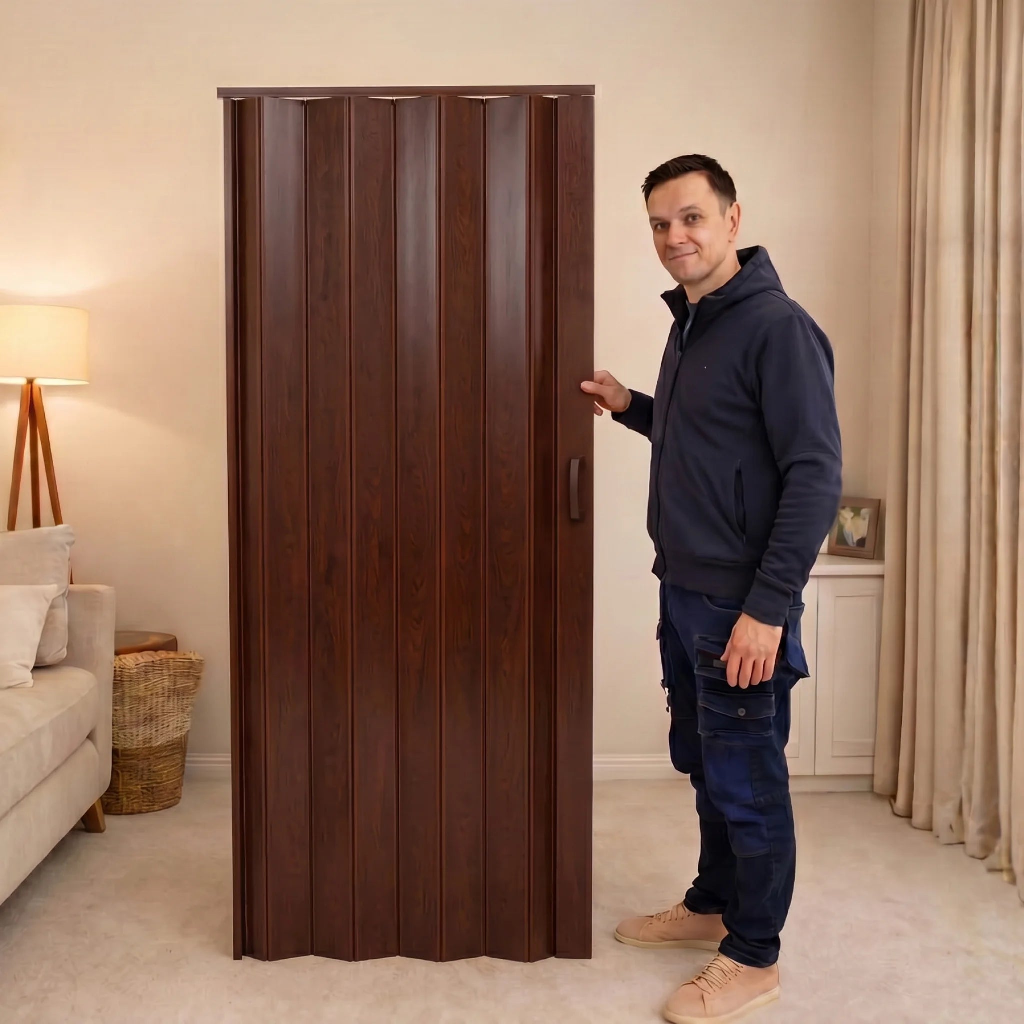 Man standing beside PVC folding door