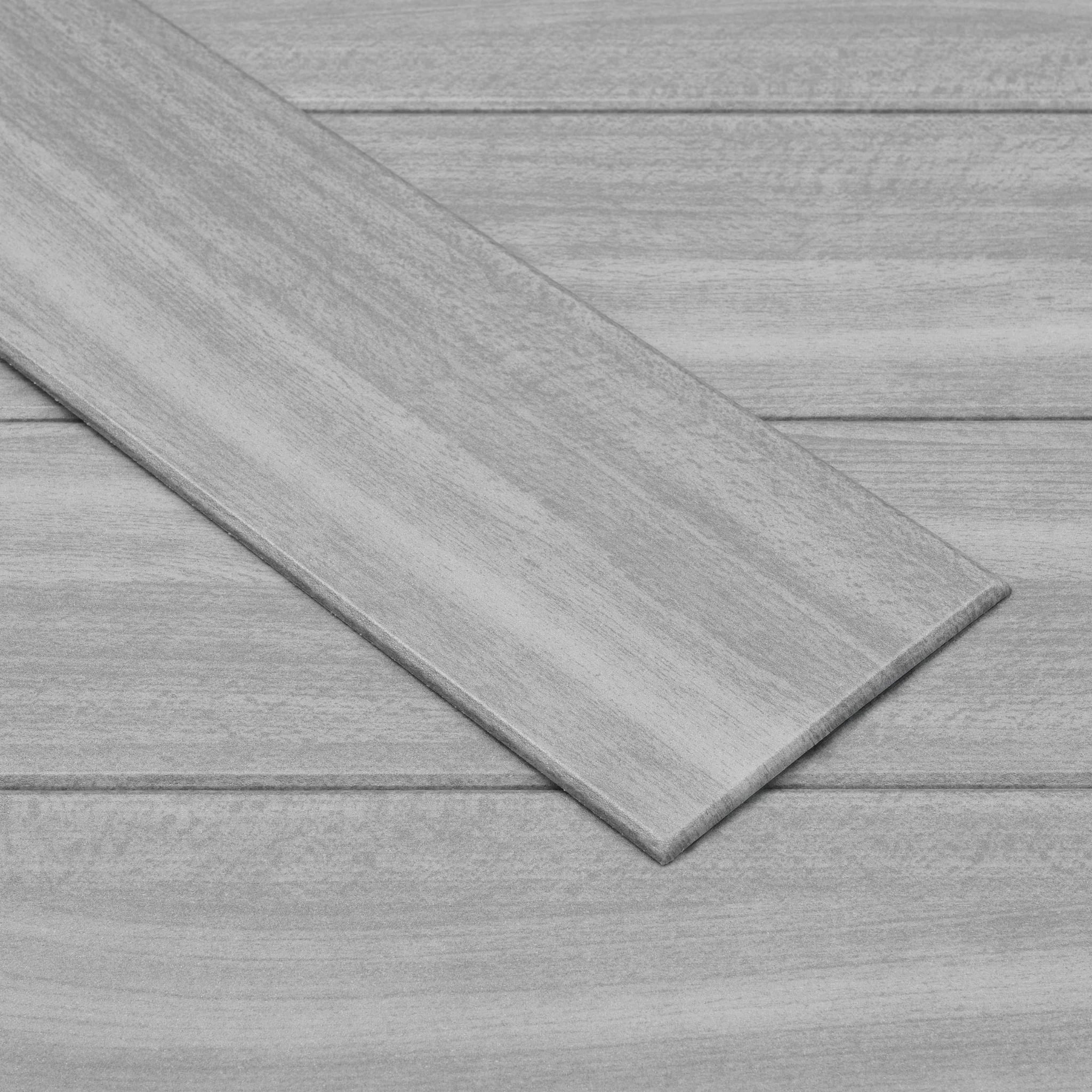 Close-up of gray wall cladding panels wood effect