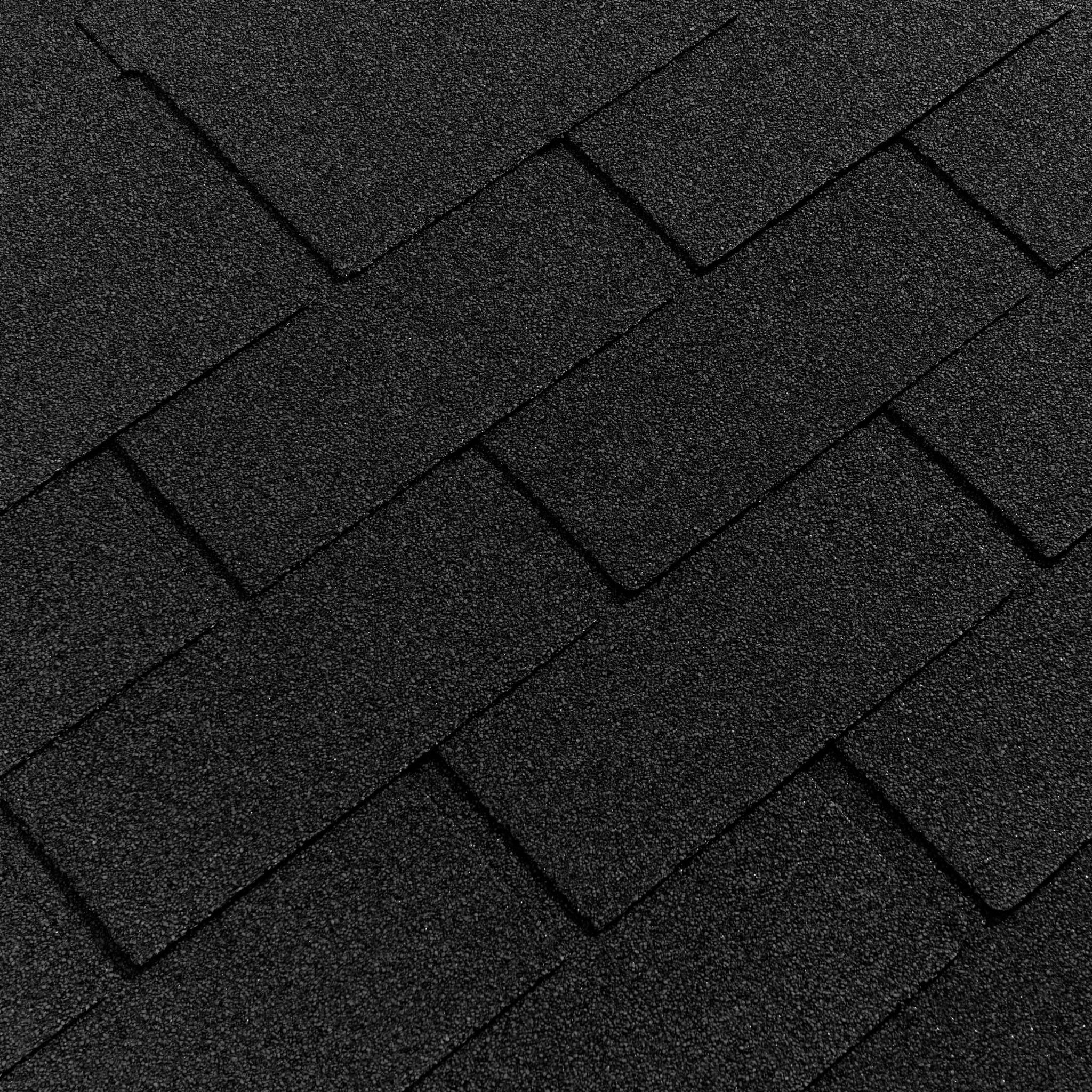 Close-up view of graphite asphalt roof shingles