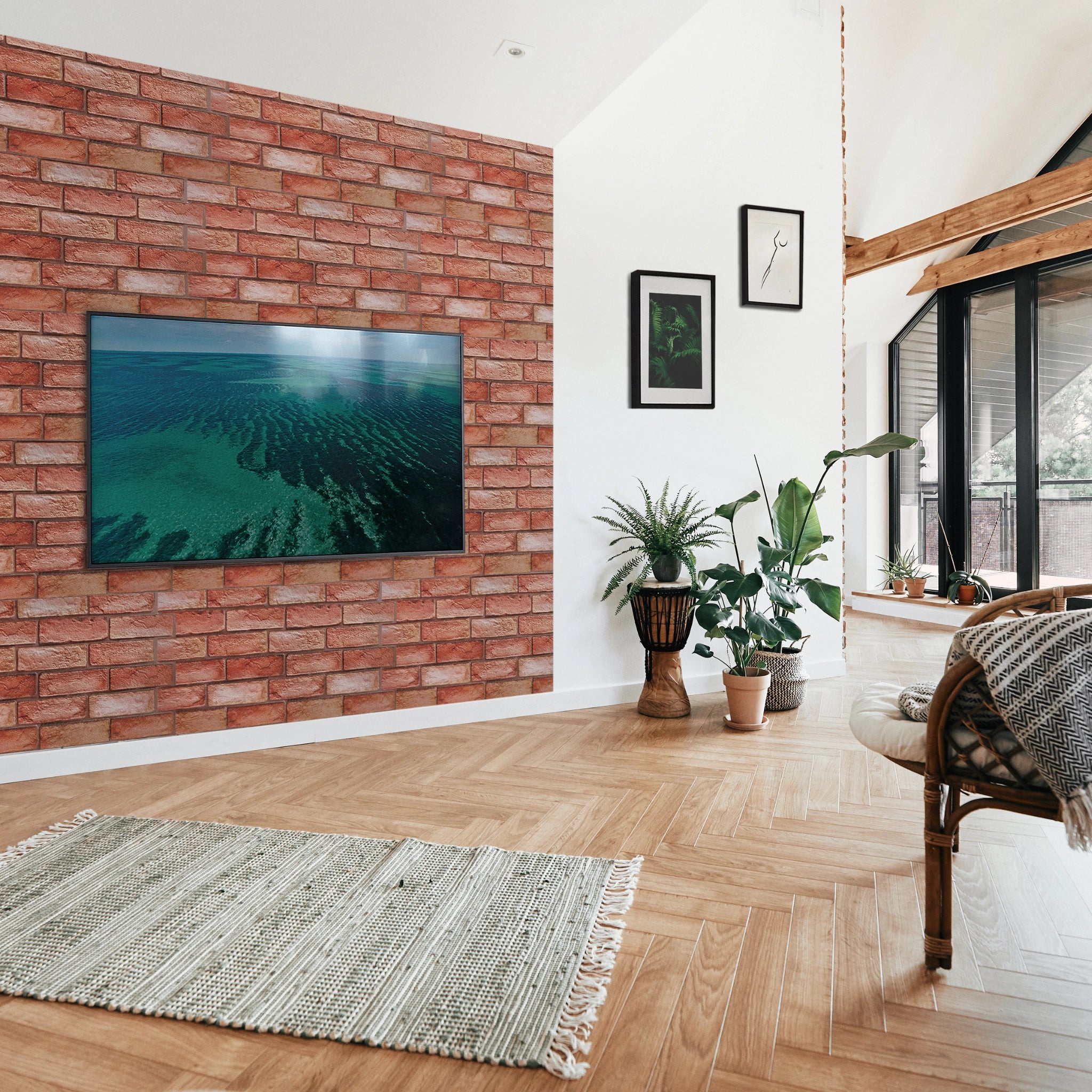 Modern living room with red wall panel featuring geometric patterns