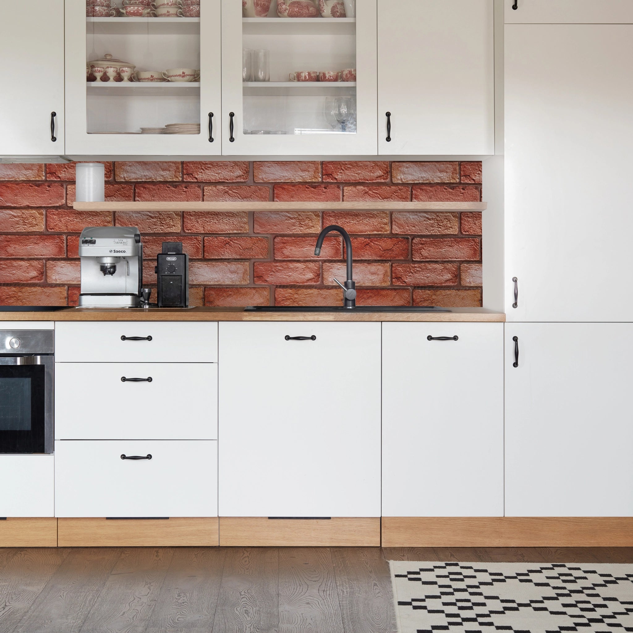 Kitchen with red geometric-patterned wall panels and modern decor