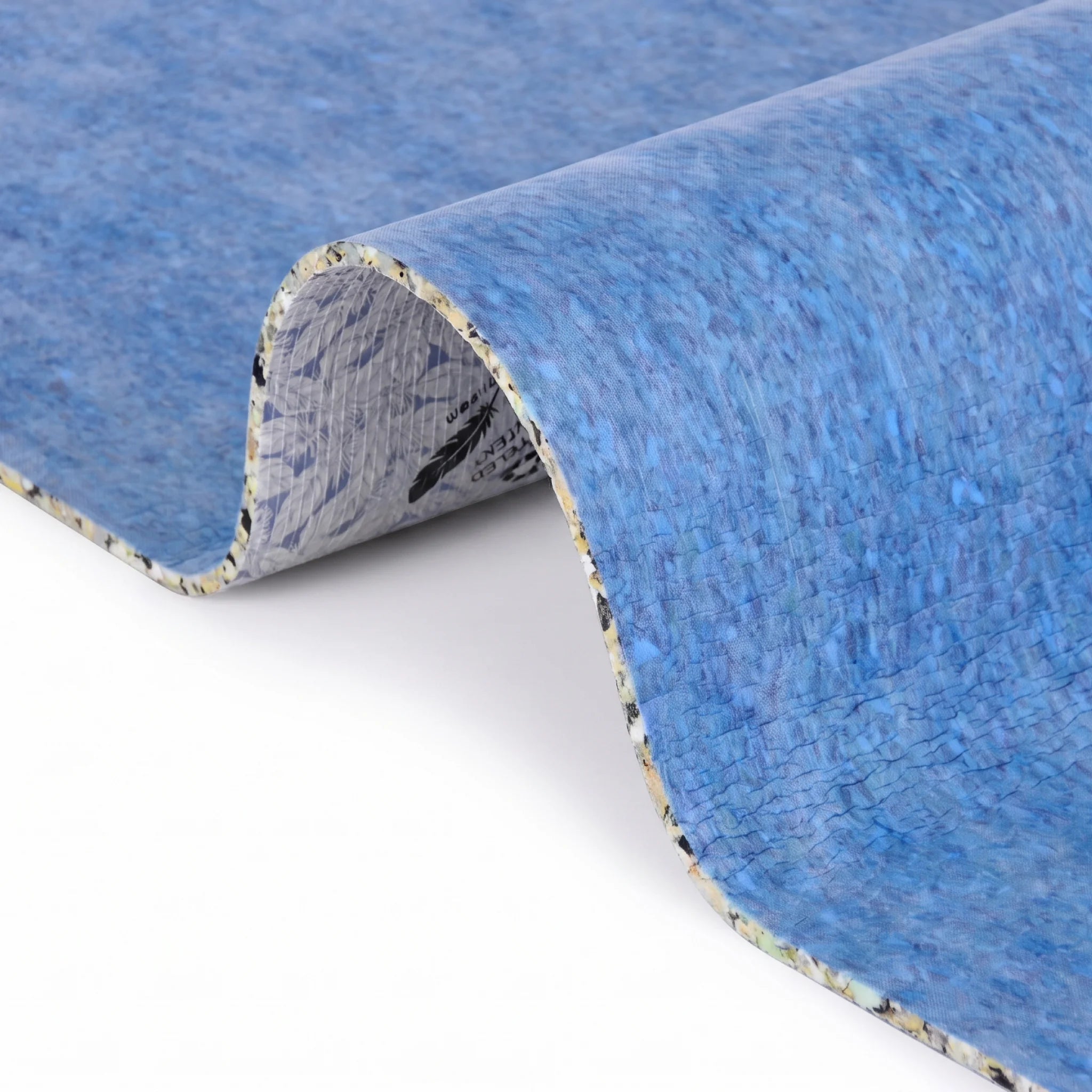 Foam underlay curled showing recycled base