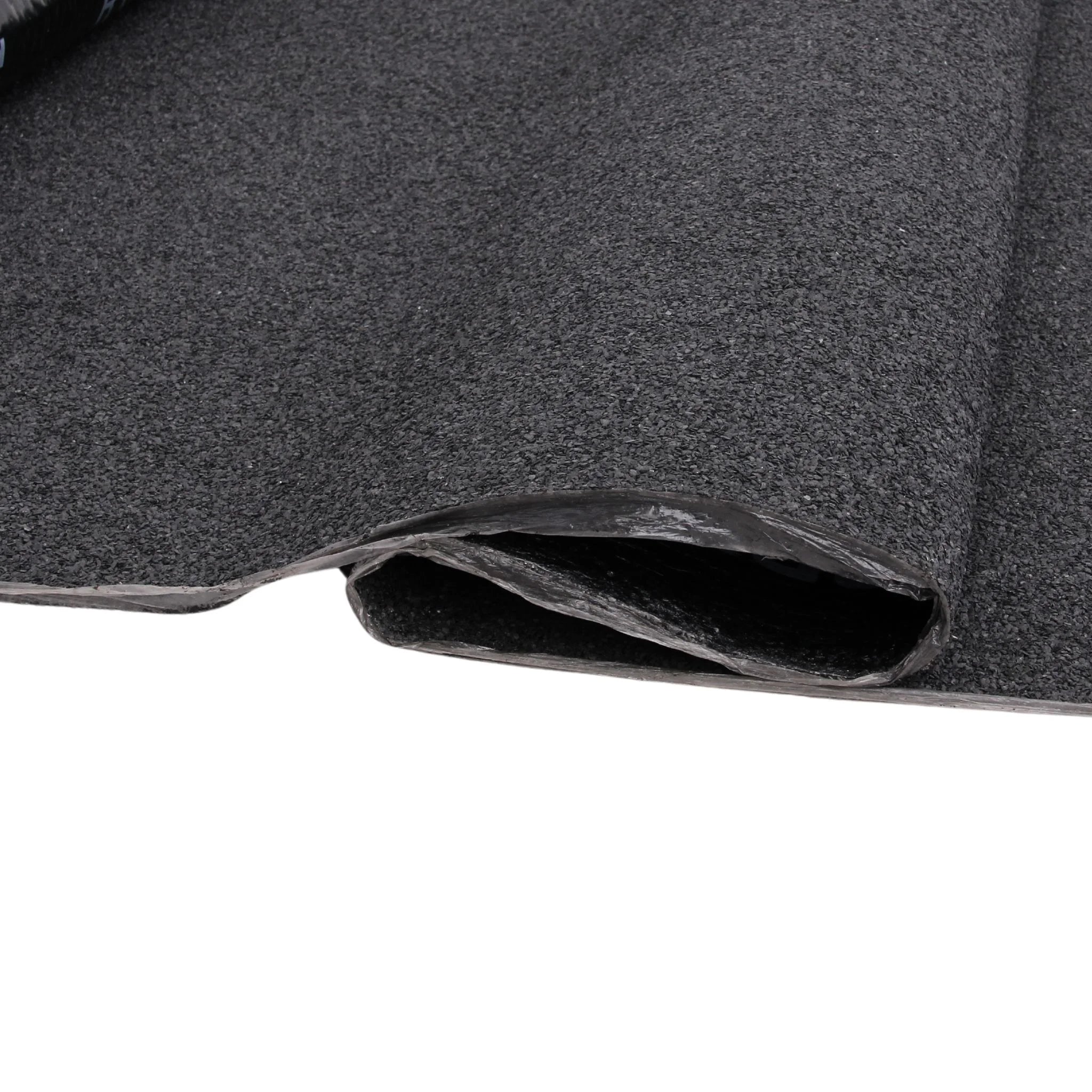 close-up of rolled cap sheet material with black granular texture