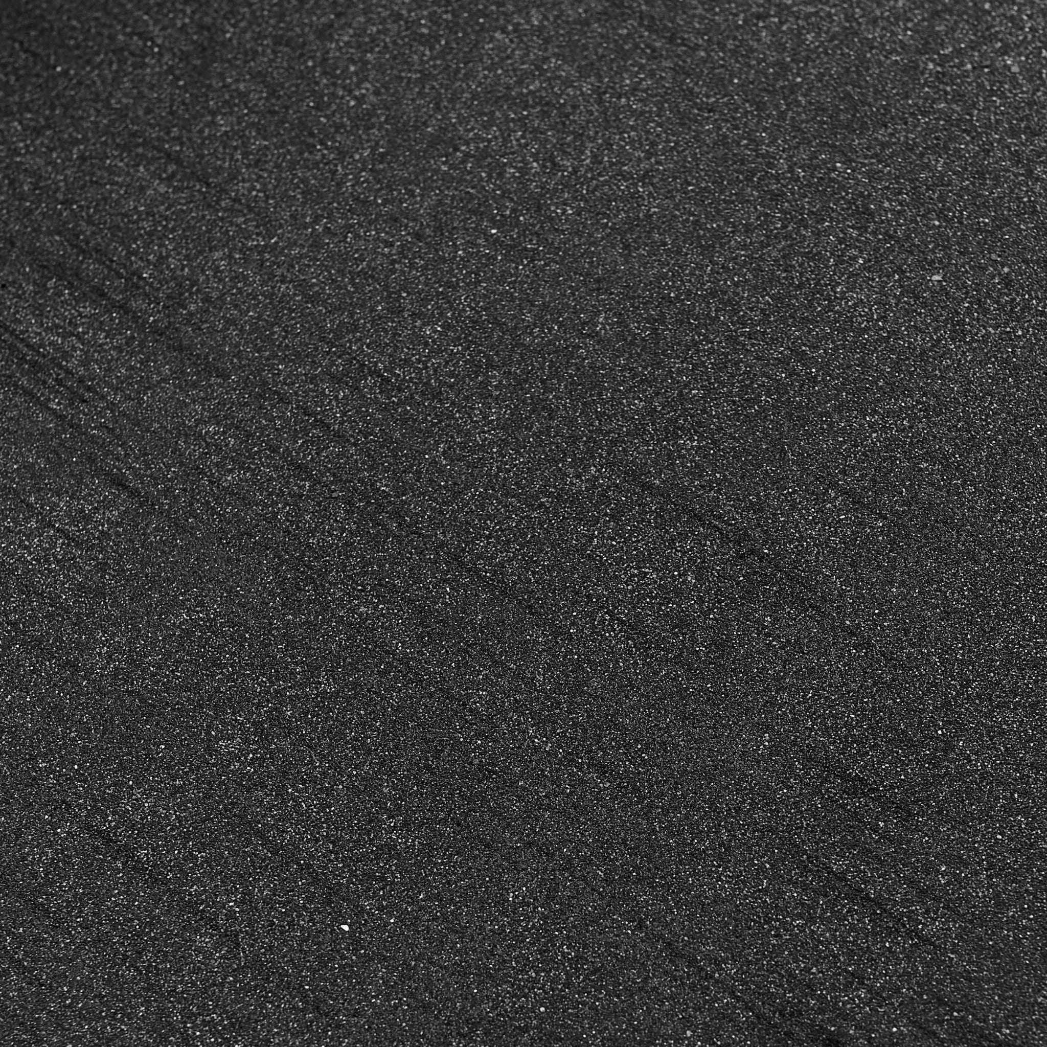 close-up view of black textured underlay material