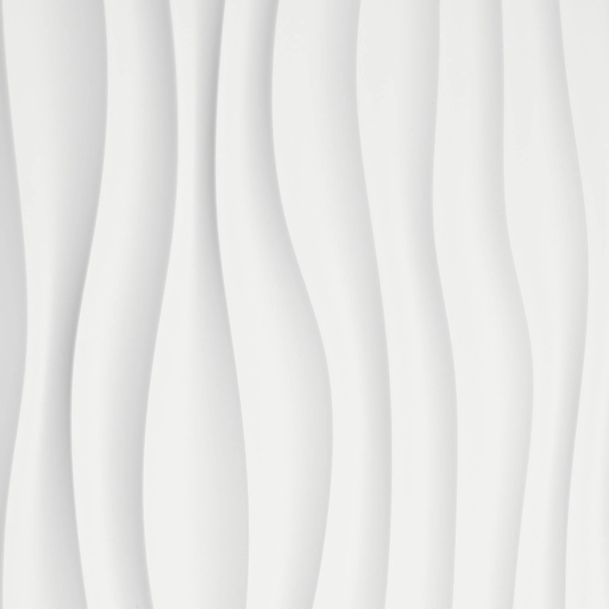 Close-up of white PVC wall panel with wavy pattern