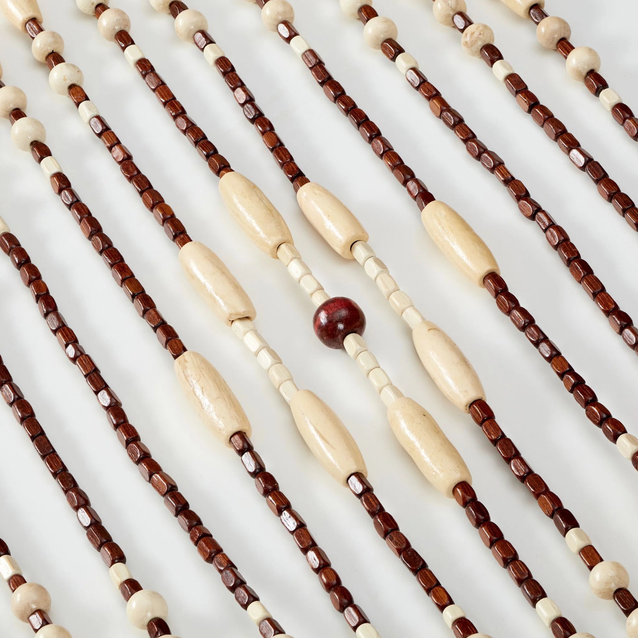 Wooden beads in varying shades close-up view