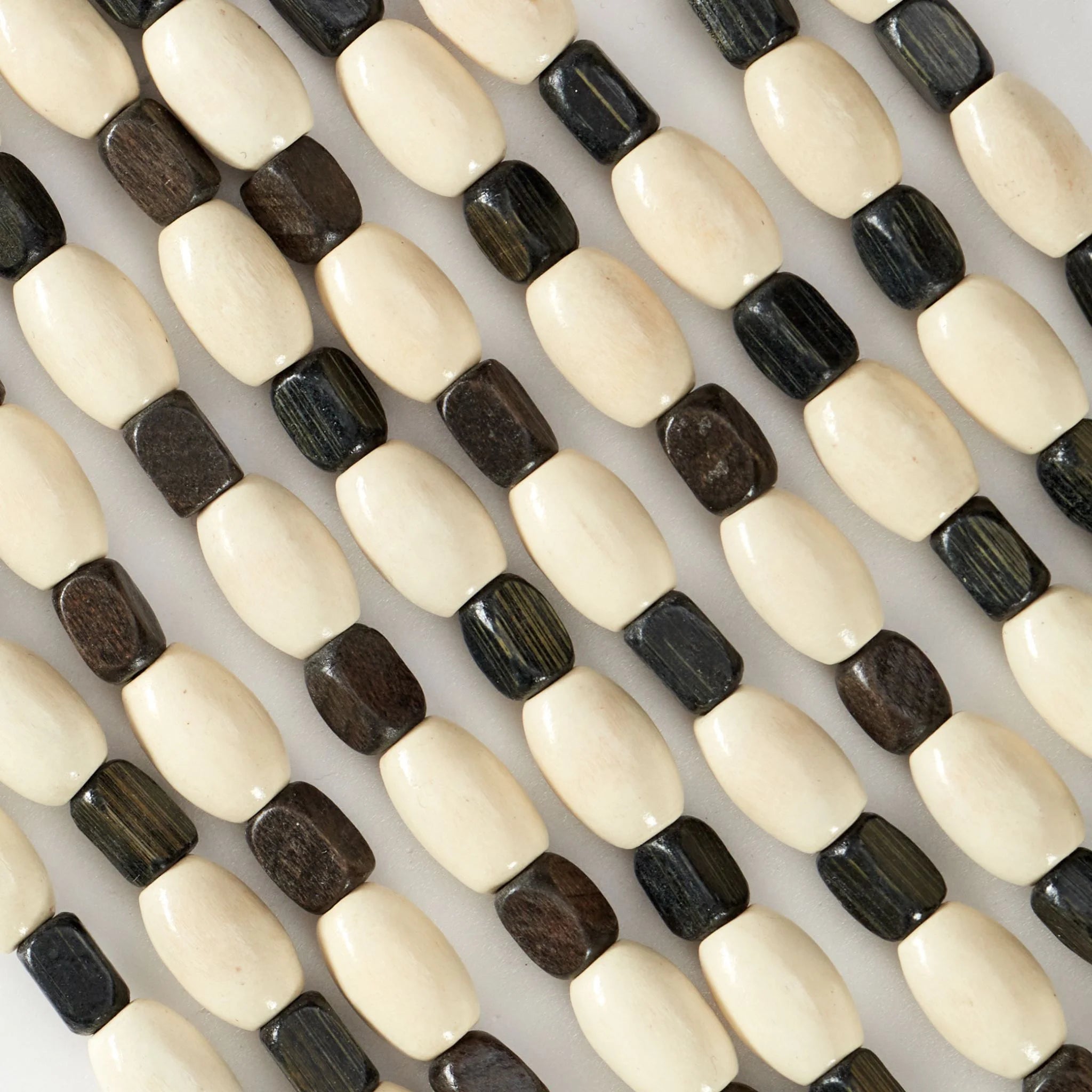 Black and white wooden beads close-up view